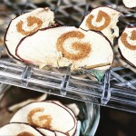 Google Branded Red Apple Garnishes With Cinnamon G Logo