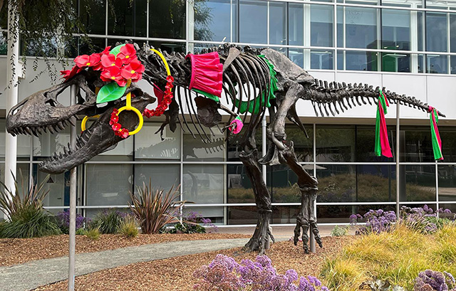 Google Stan Dinosaur Dressed Up For???