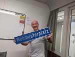 John Mueller Holding A Google Webmasterplatz Sign