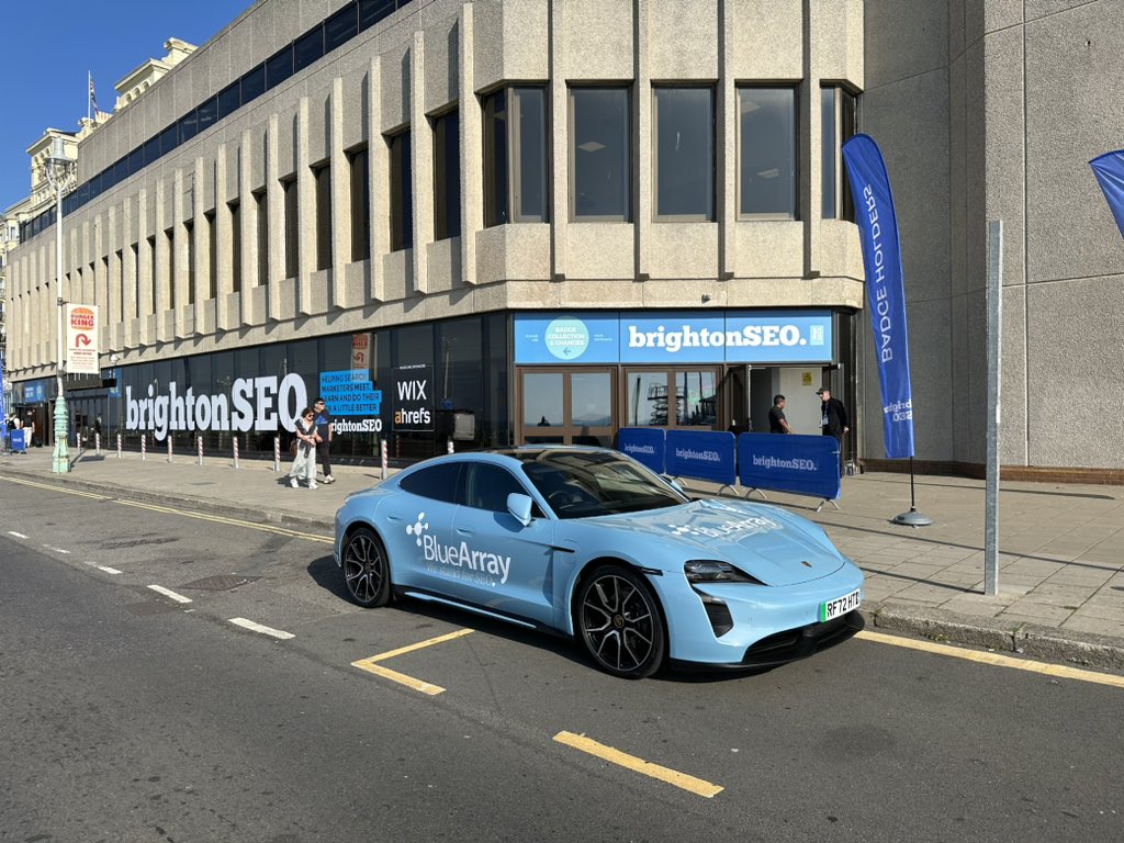 BlueArray Porsche Taycan Parked Outside BrightonSEO